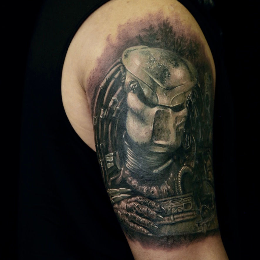 Realism statue tattoo